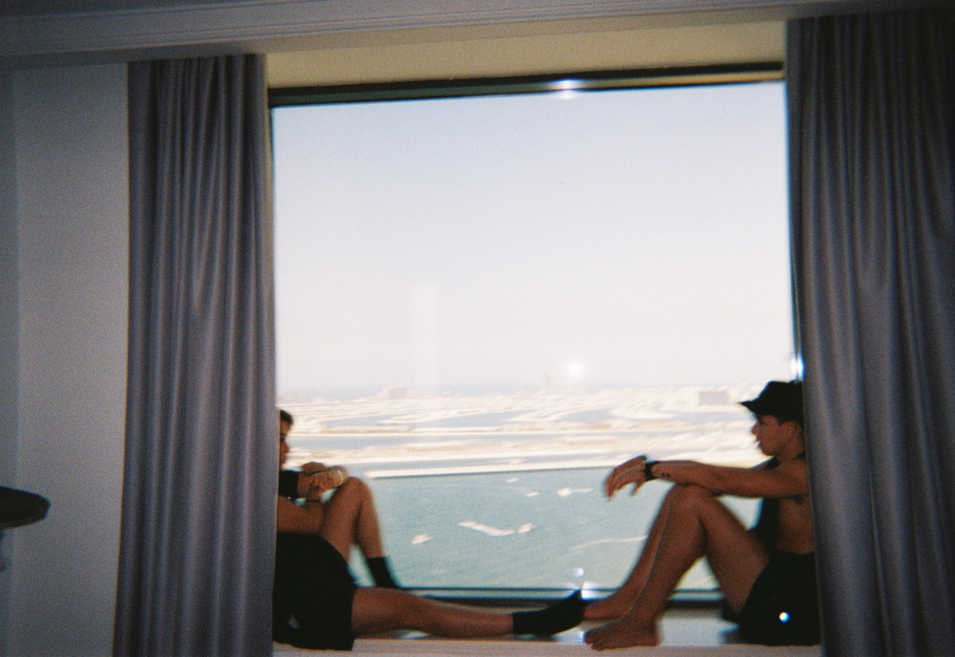 Members reflecting in front of a large projection