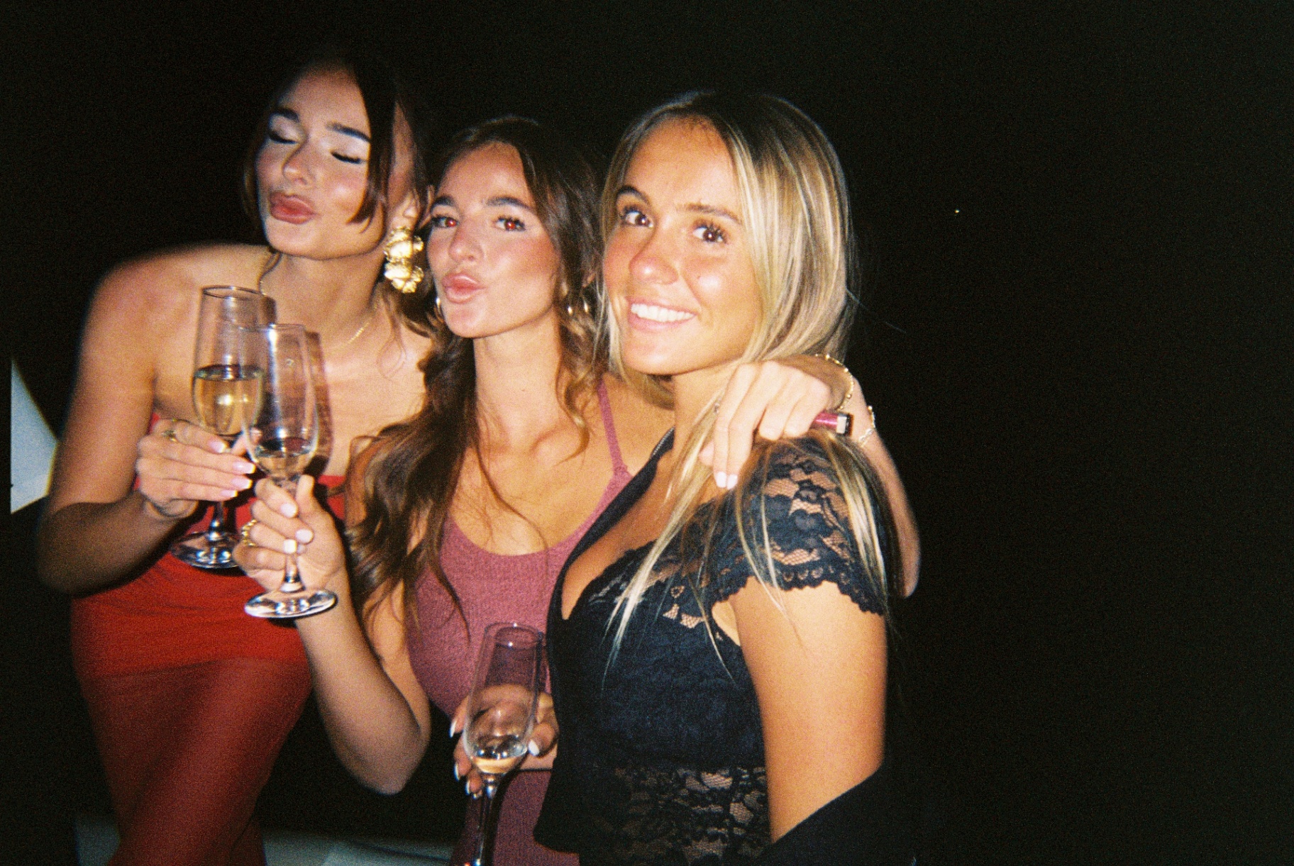 Members celebrating with champagne